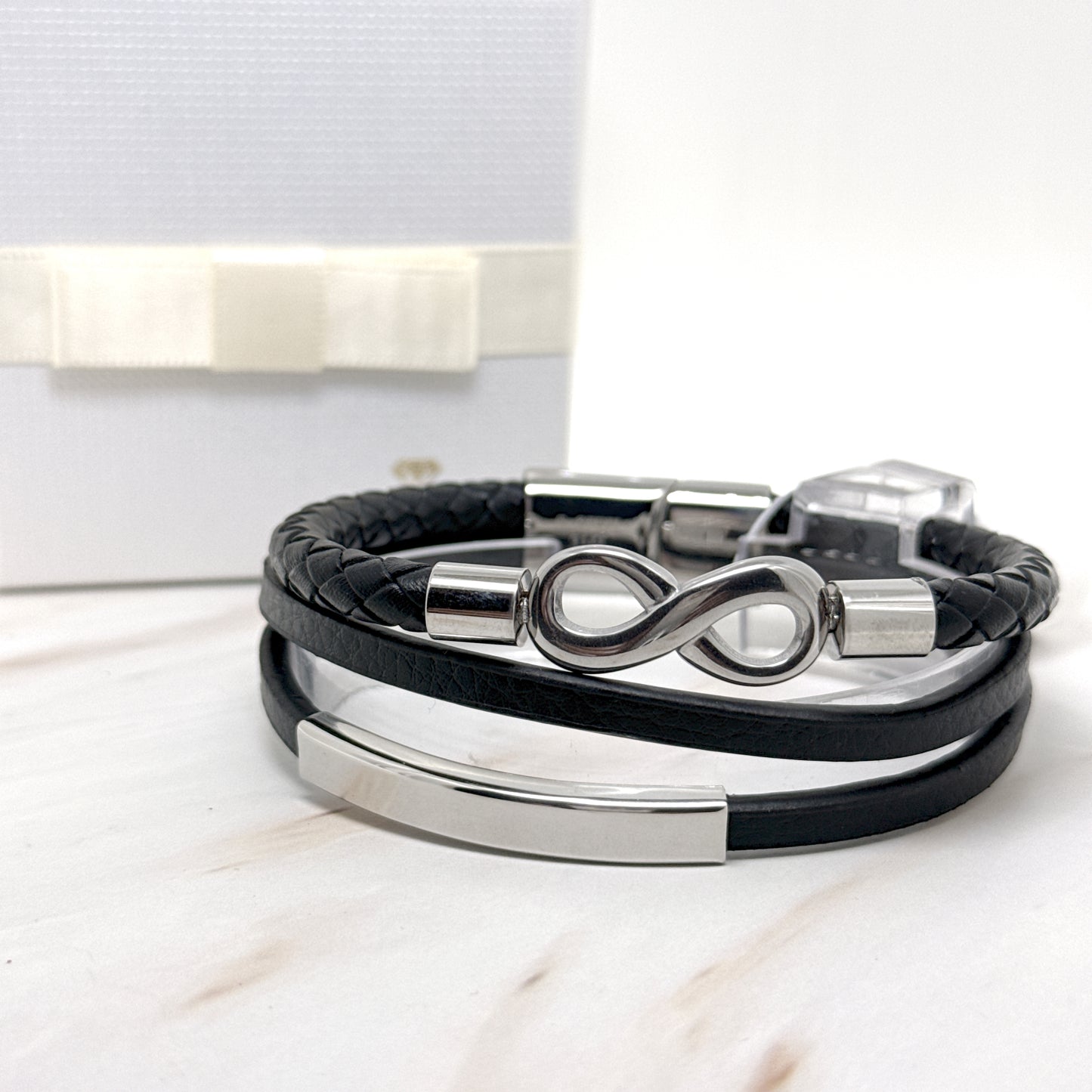 BRACCIALE INFINITO CUOIO INTRECCIO