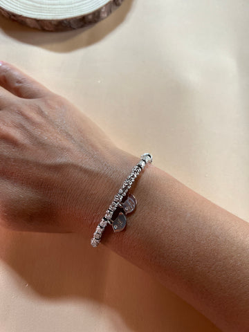 BRACCIALE CON PEPITE E RONDINI PENDENTI