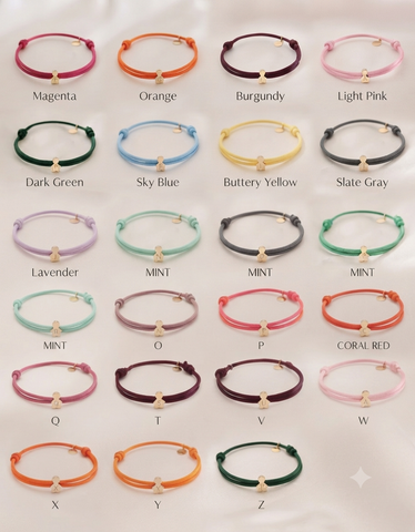 BRACCIALE E COLLANA IN TESSUTO CON CHARMS