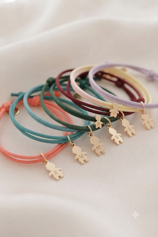 BRACCIALE E COLLANA IN TESSUTO CON CHARMS
