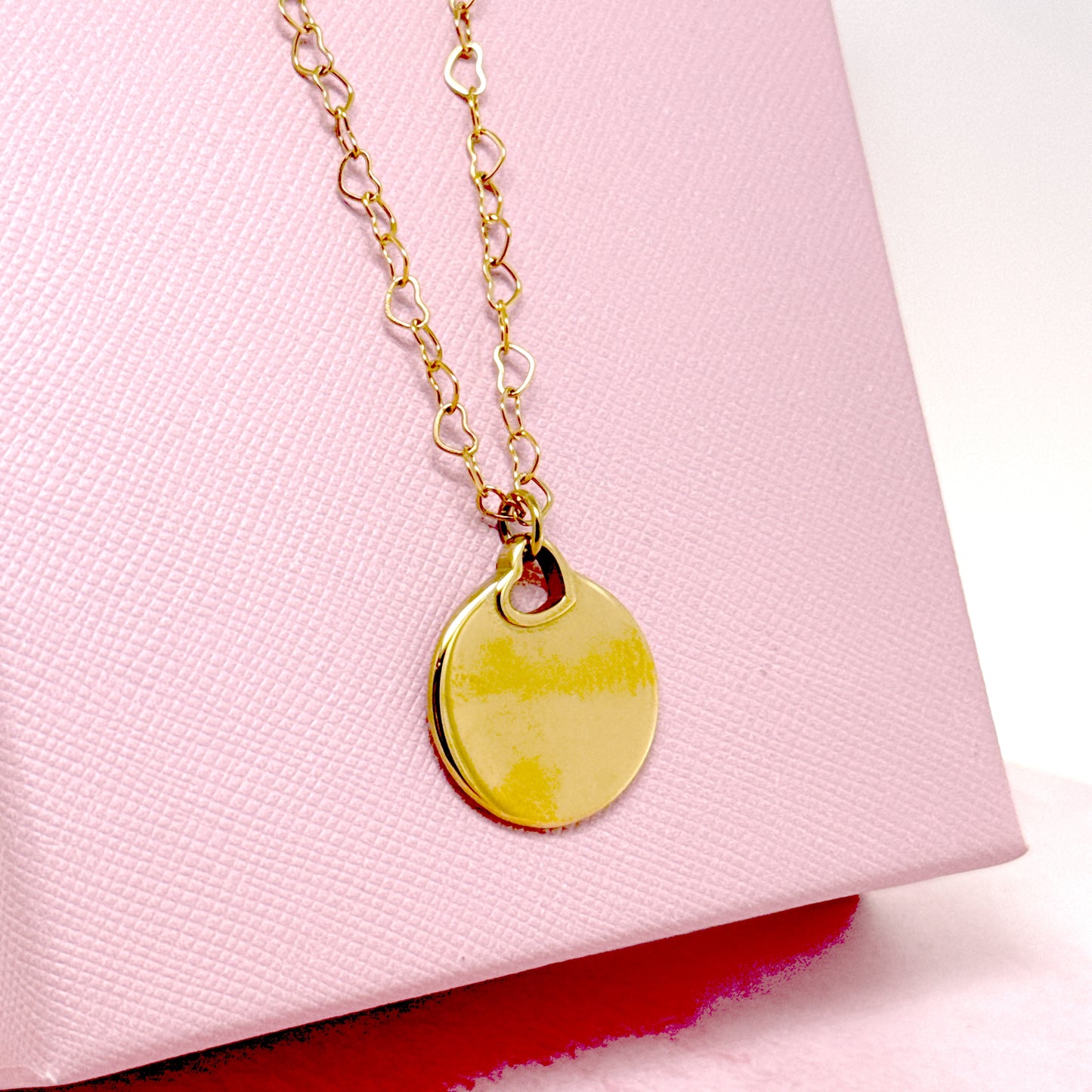 COLLANA MEDAGLIA CIRCOLARE CON CUORE TRAFORATO