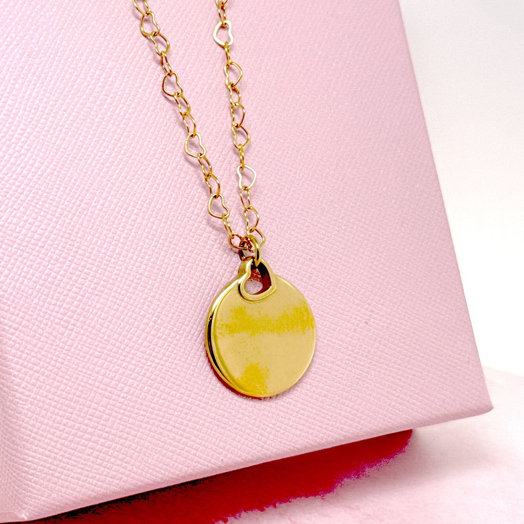 COLLANA MEDAGLIA CIRCOLARE CON CUORE TRAFORATO