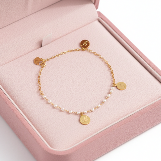 BRACCIALE CON PERLE E CATENA